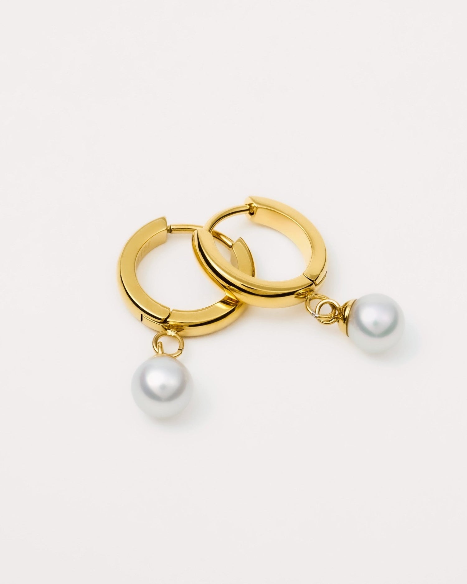 Freshwater Pearl Huggie Hoop Earrings in Gold — titanium — Rhokea