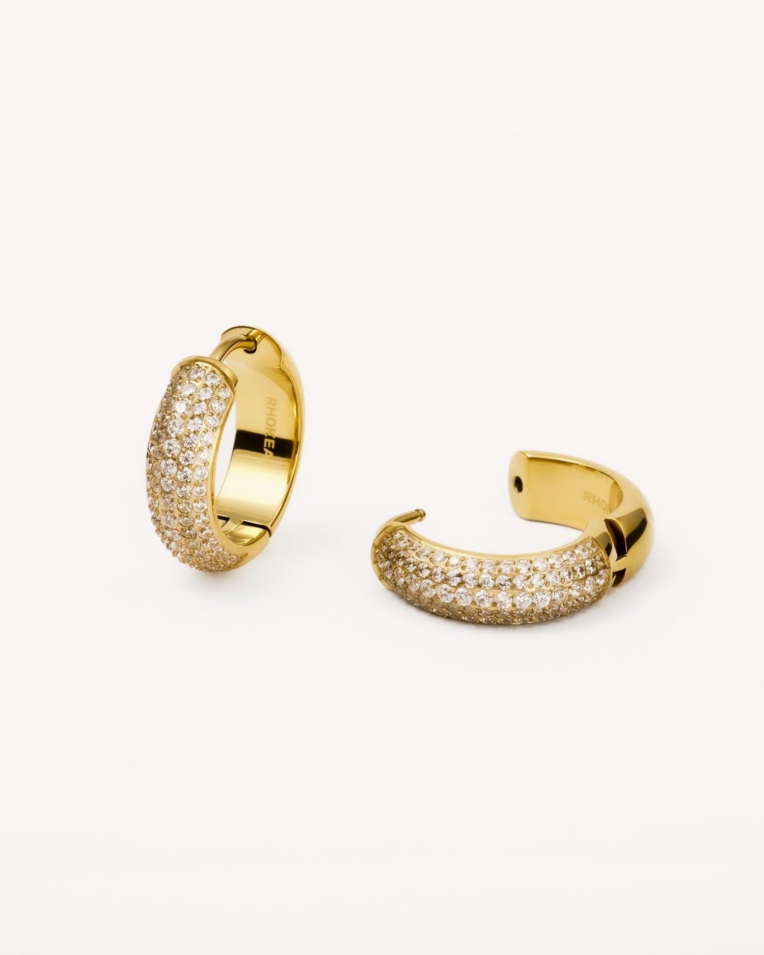 Bold Pavé Huggie Hoop Earrings in Gold — titanium — Rhokea