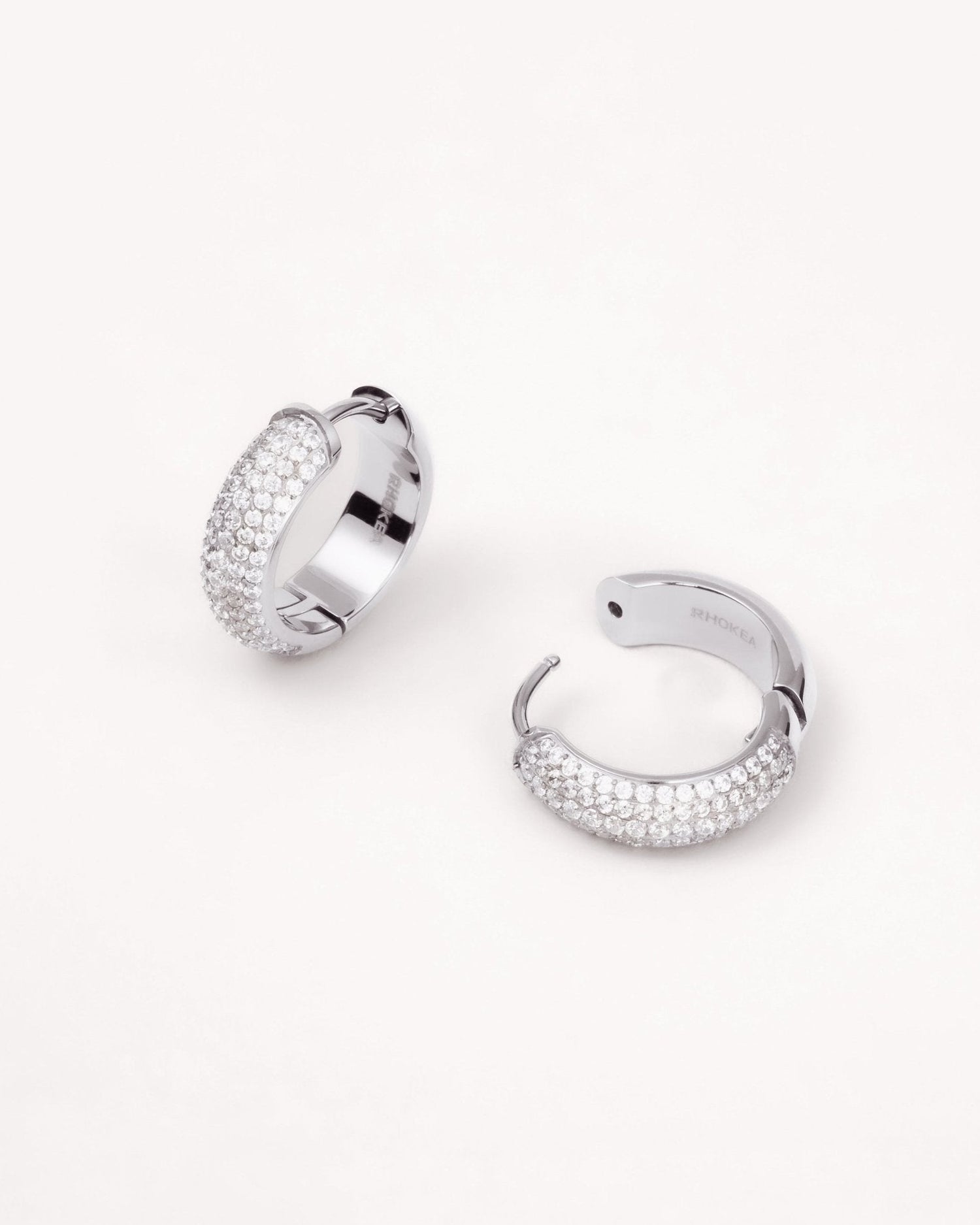 Bold Pavé Huggie Hoop Earrings in Silver — titanium — Rhokea