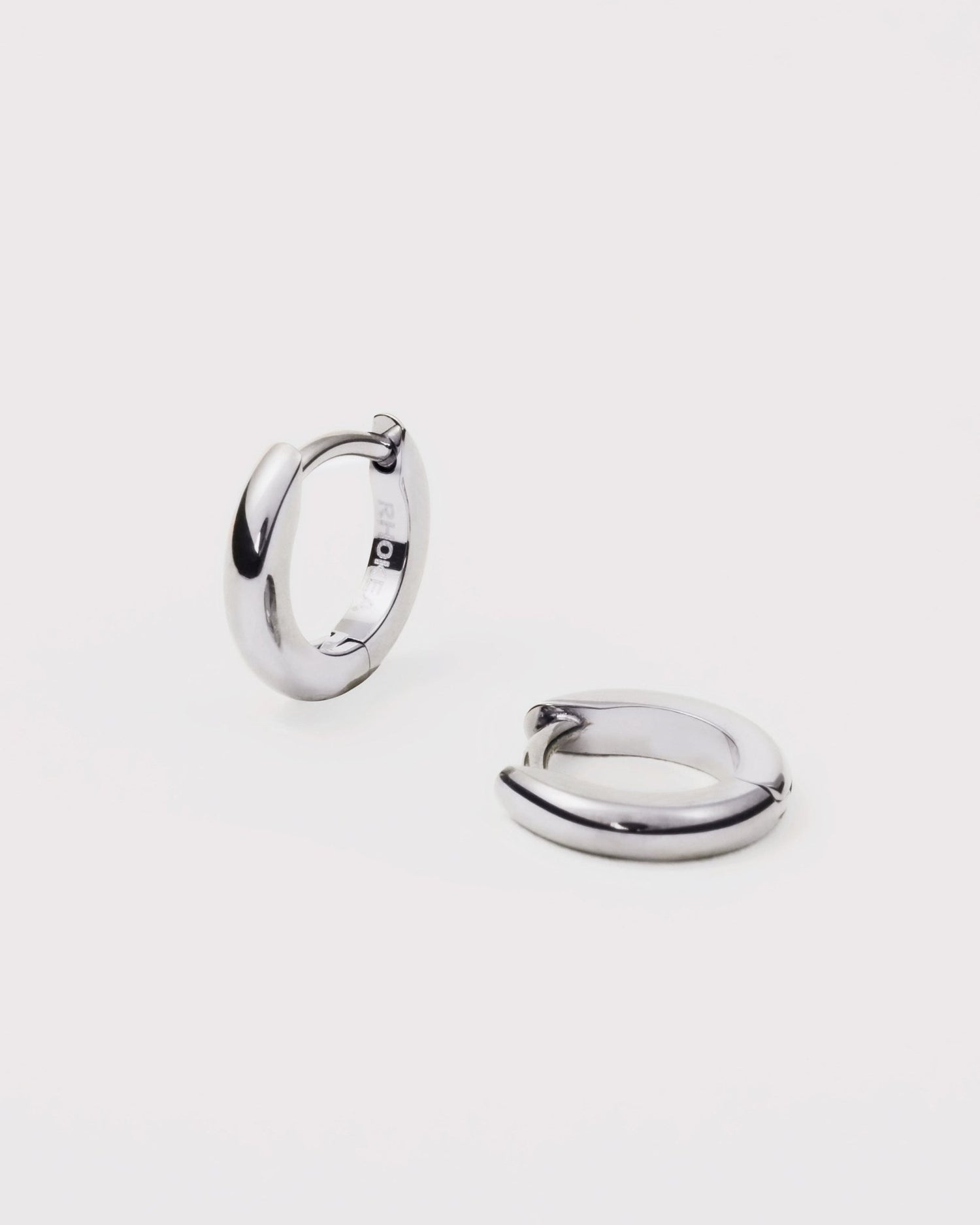 Small Huggie Hoop Earrings in Silver — titanium — Rhokea