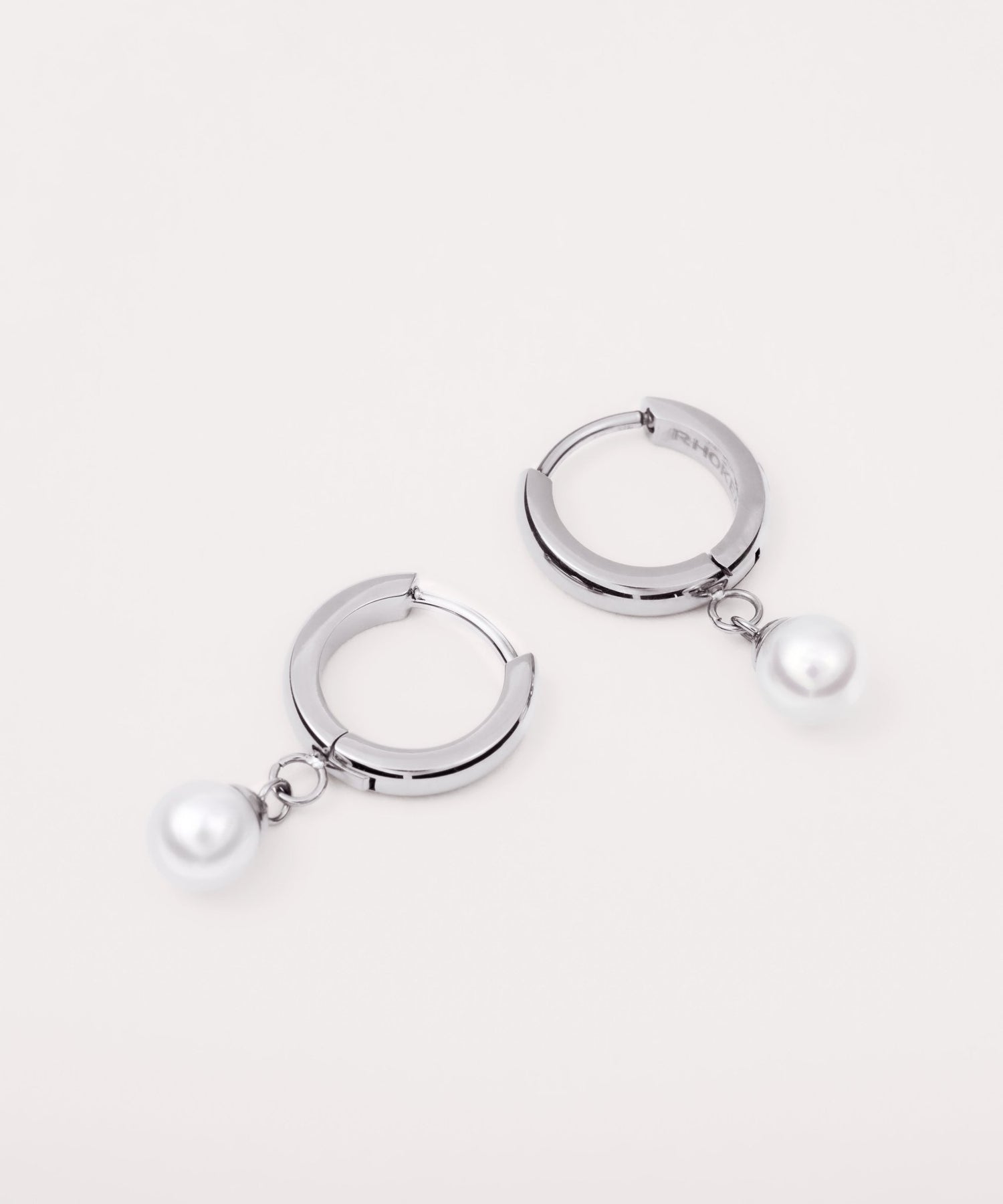 Freshwater Pearl Huggie Hoops in Silver — titanium — Rhokea