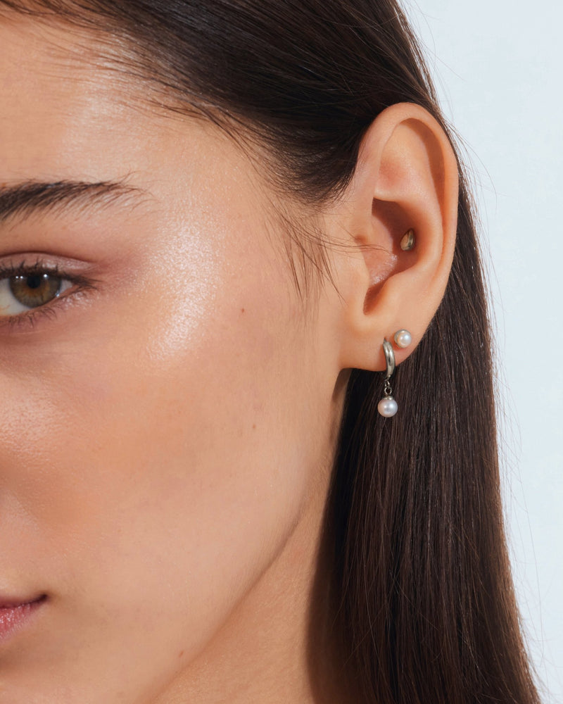 Freshwater Pearl Huggie Hoops in Silver — titanium — Rhokea
