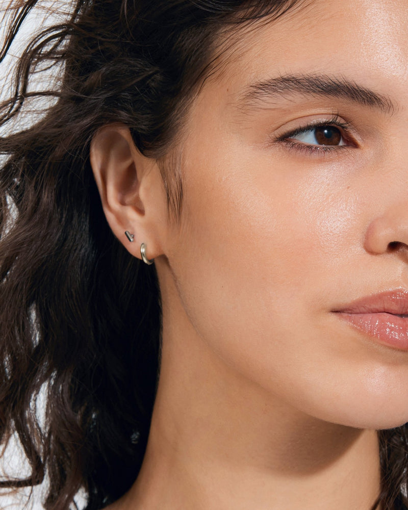 Small Huggie Hoop Earrings in Silver — titanium — Rhokea